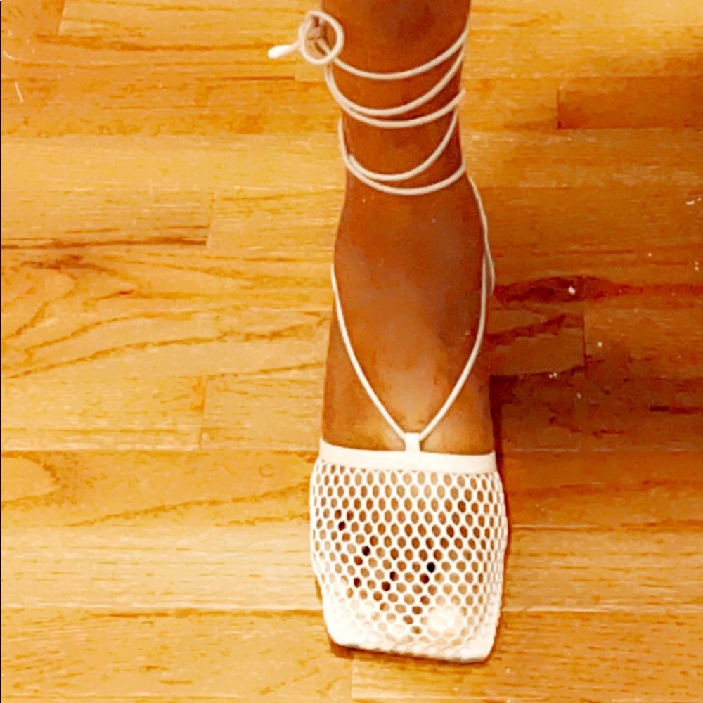 Cream colored mesh sandals that lace up. Size 9.5